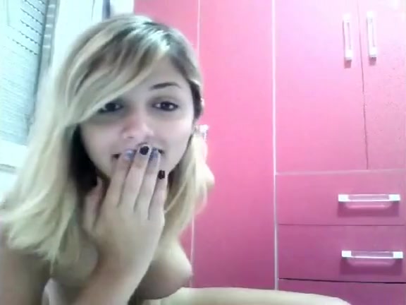 Playful sheboy in bed takes a huge dildo