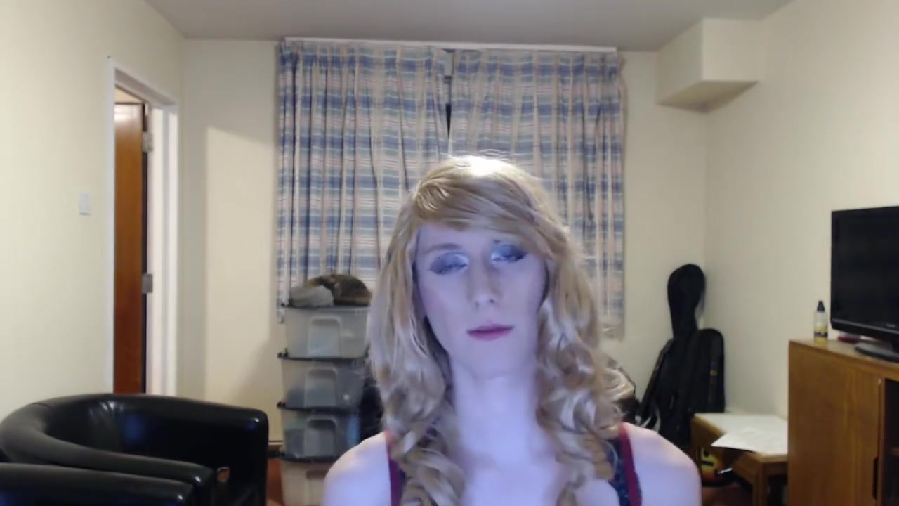 Sissy crossdresser sucks a dildo and fucks her ass