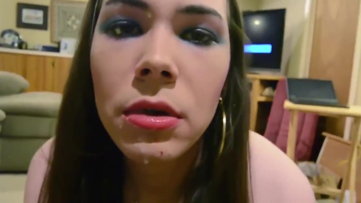 T-girl sucks cock on her knees