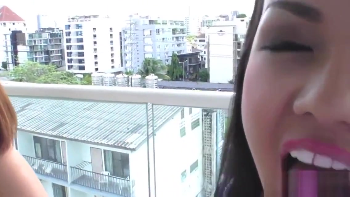Asian tgirl sucks dildo