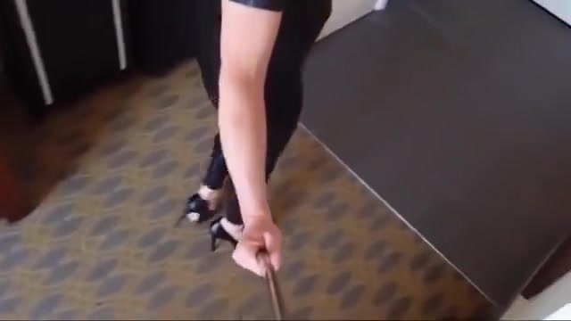 sissy wiggling in tight black leggings and high heels