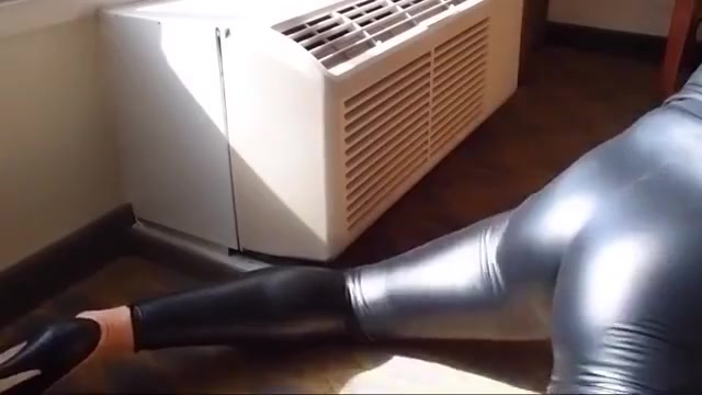 sissy wiggling in tight black leggings and high heels