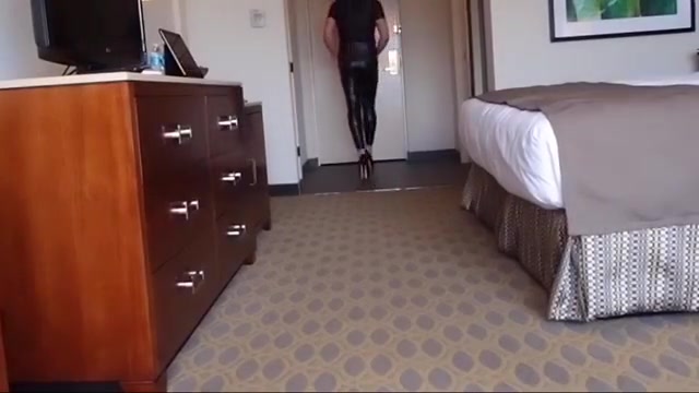 sissy wiggling in tight black leggings and high heels