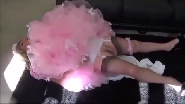 Madame C puts Angelica in nappy plastic pants