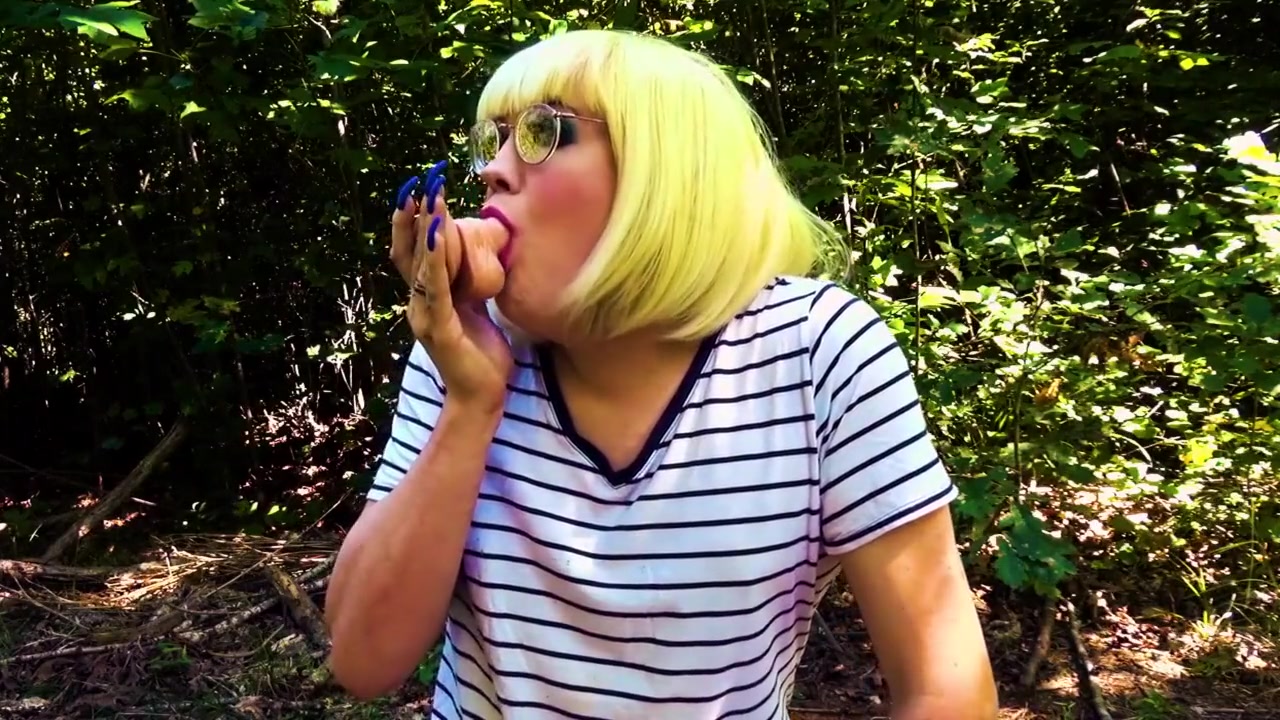 Blonde Trans Girl Deepthroats Dildo Outside