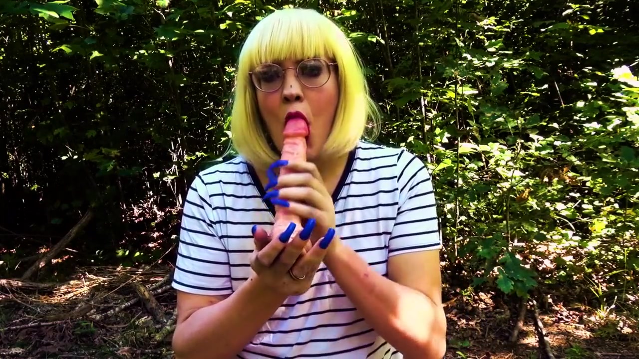 Blonde Trans Girl Deepthroats Dildo Outside