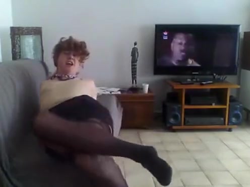 Crossdresser in skirt, panties top