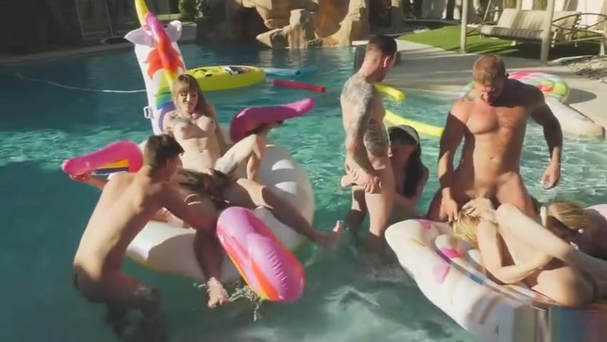 4 trannies and 4 guys have an anal fucking pool party orgy