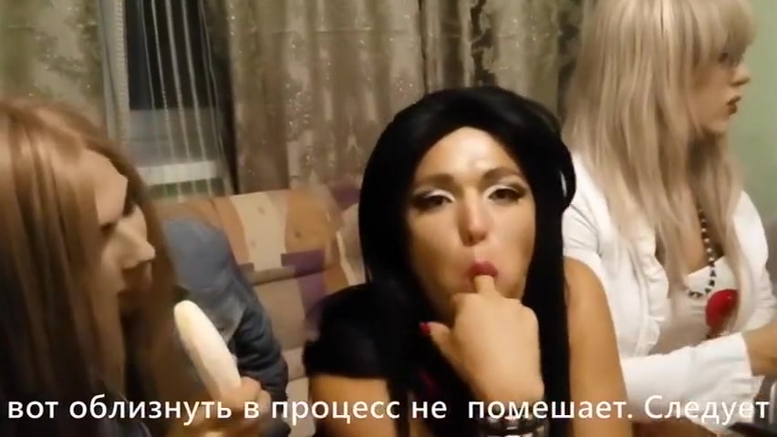 Crossdressers playing with bananas