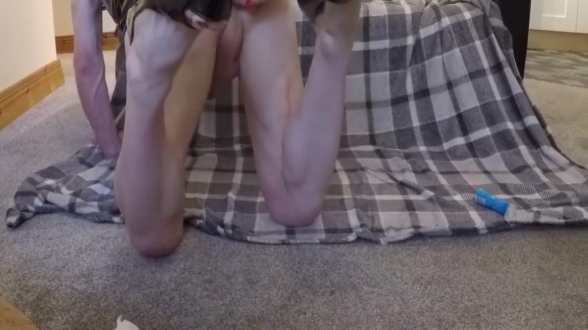 Pvc Tranny Takes Dildo In Ass