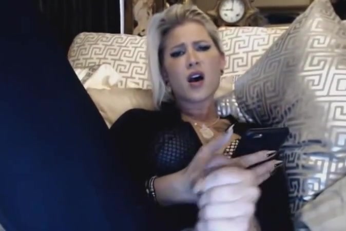 Sexy milf stroking her big cock