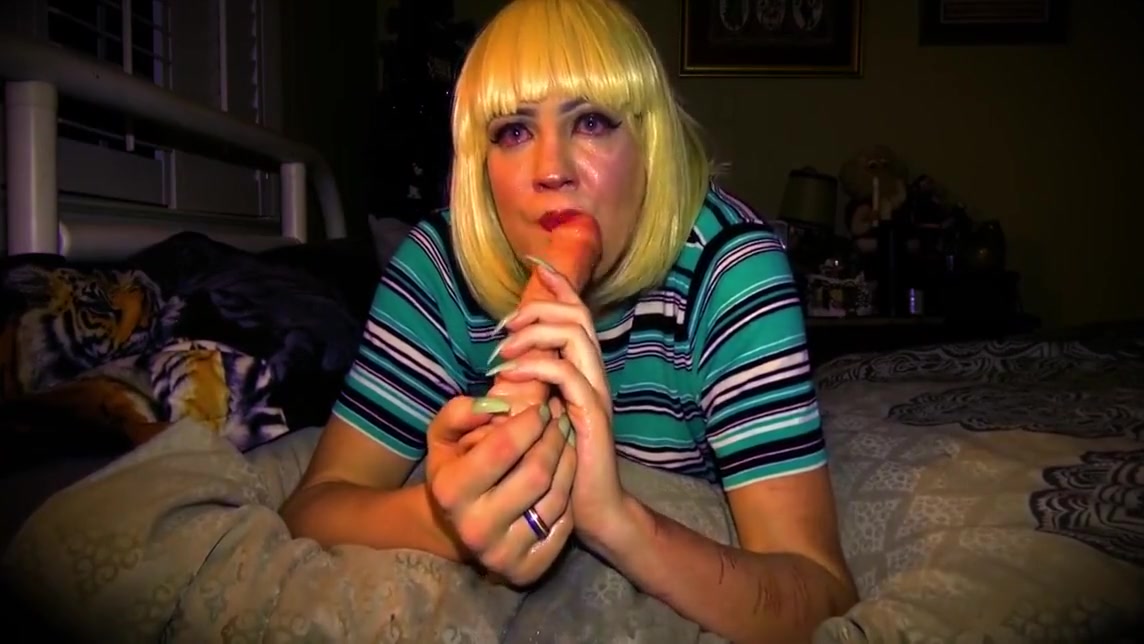 Blonde Tgirl Deepthroats Dildo