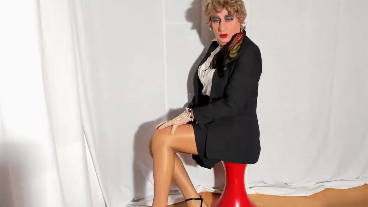 Elegant Woman Caressing Her Nyloned Legs