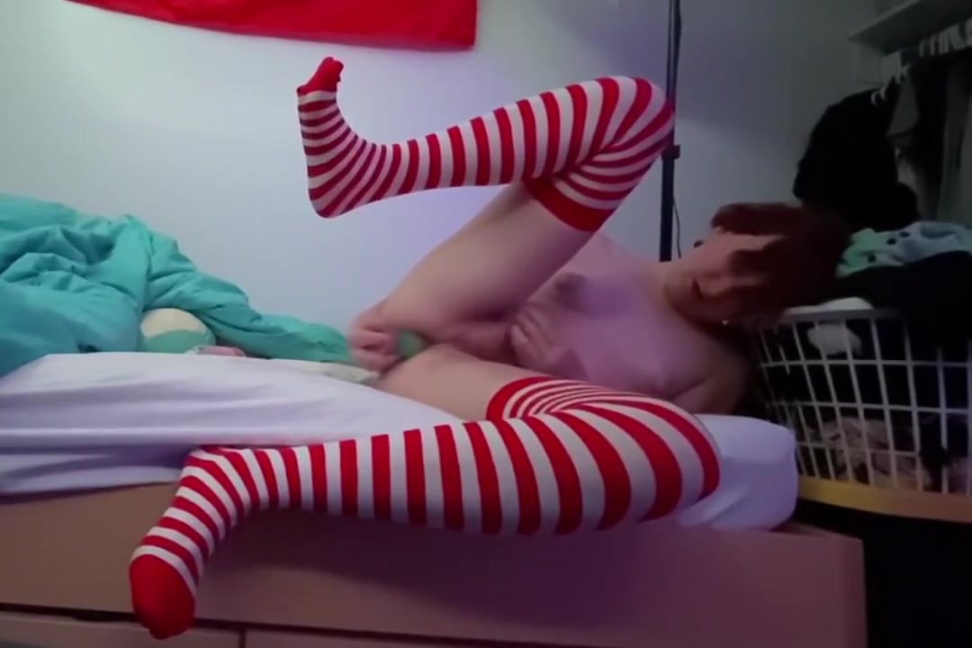 Redhead Transgirl Fucks Her Ass With A Large Rainbow Dildo