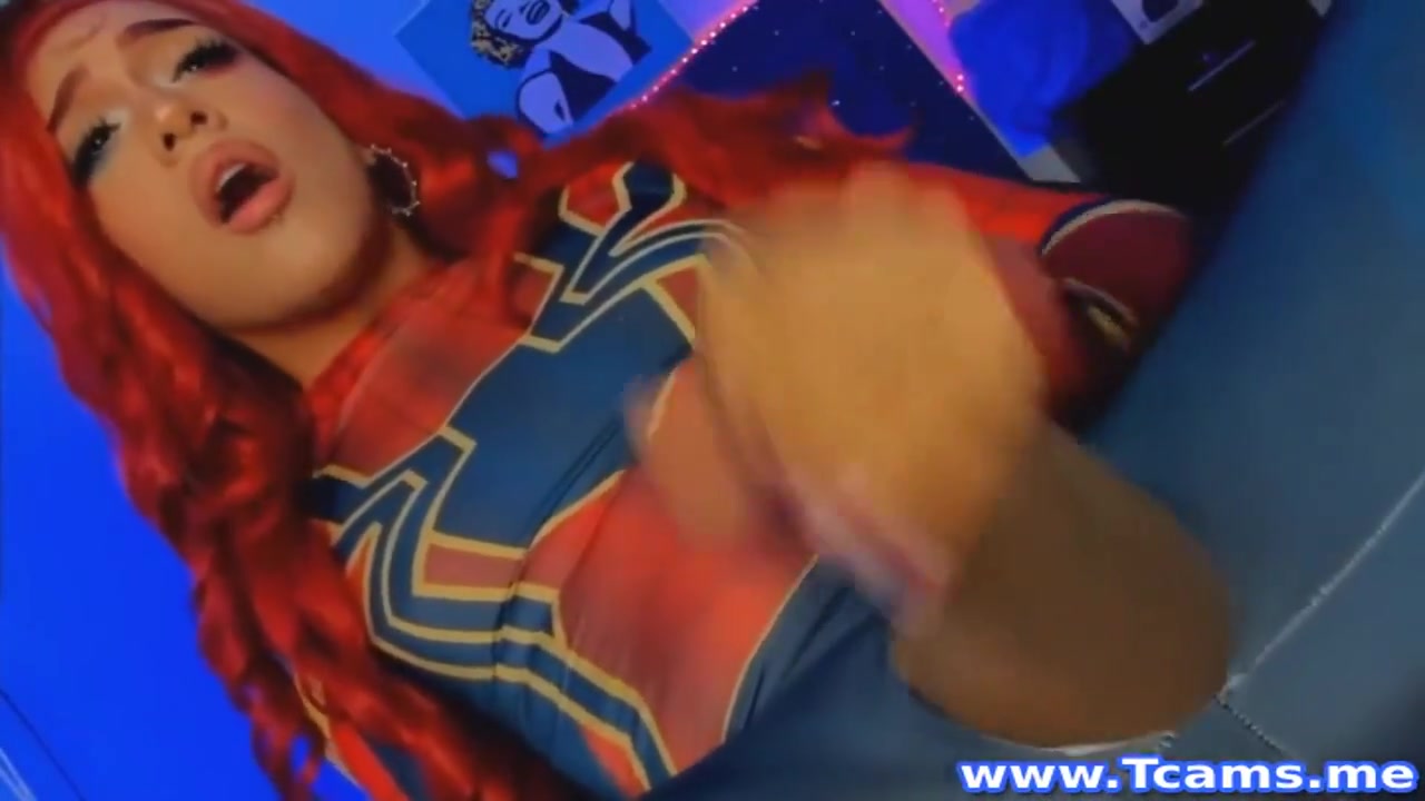 Shemale In Costume Masturbates Her Cock