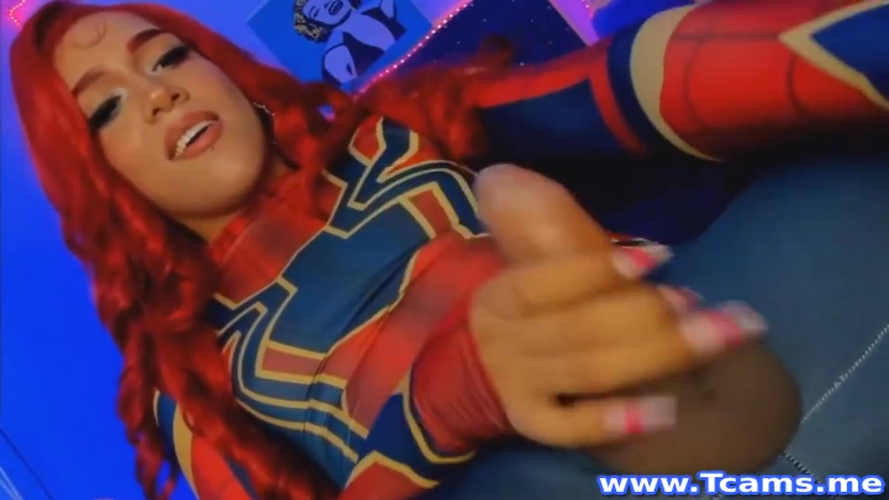 Shemale In Costume Masturbates Her Cock