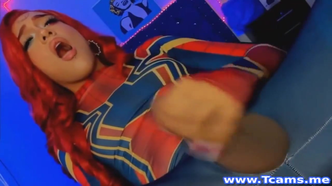 Shemale In Costume Masturbates Her Cock
