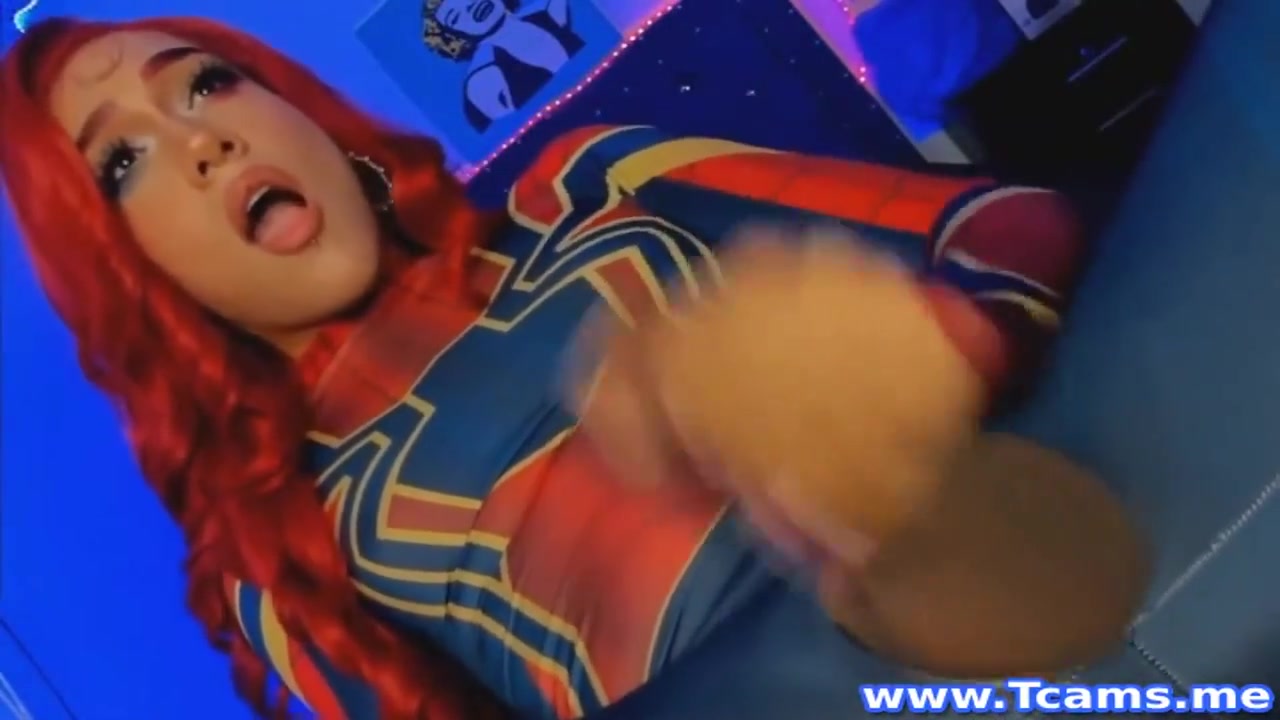 Shemale In Costume Masturbates Her Cock