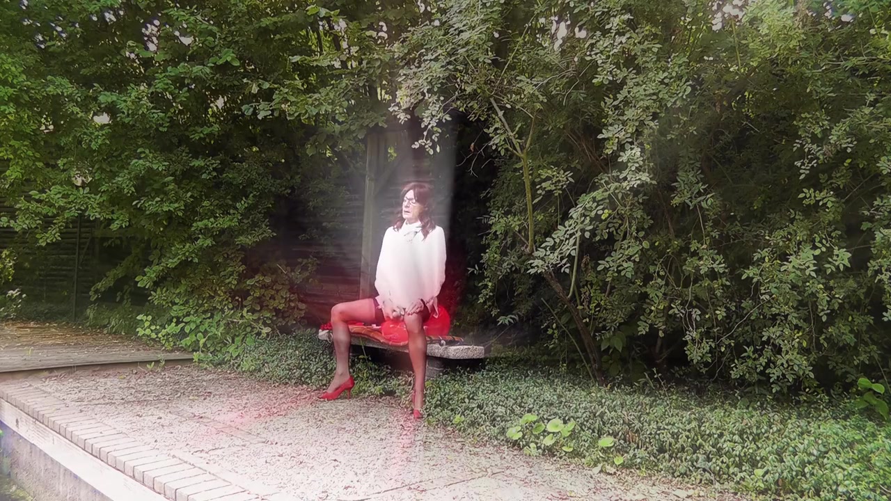 Fuckable Bum In A Red Miniskirt And Nylon Stockings