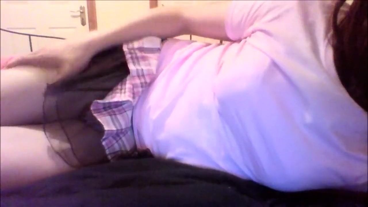Crossdresser plays with cock and cums