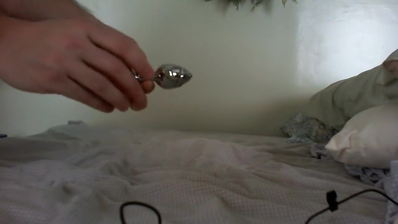 Sissy inserts butt plug and cums