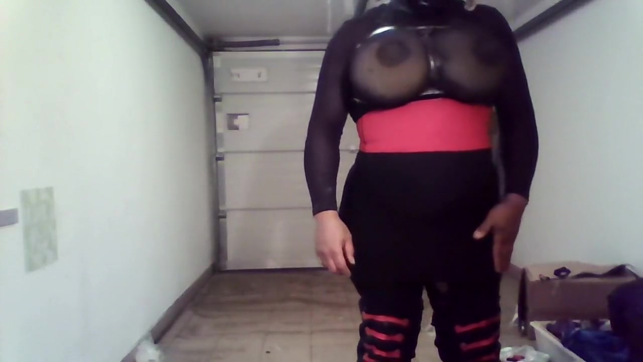 Crossdresser with black and pink boots