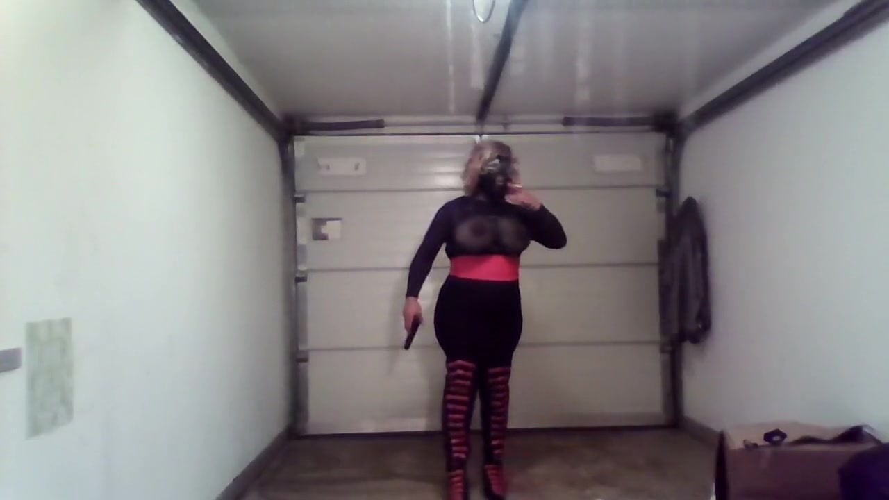 Crossdresser with black and pink boots
