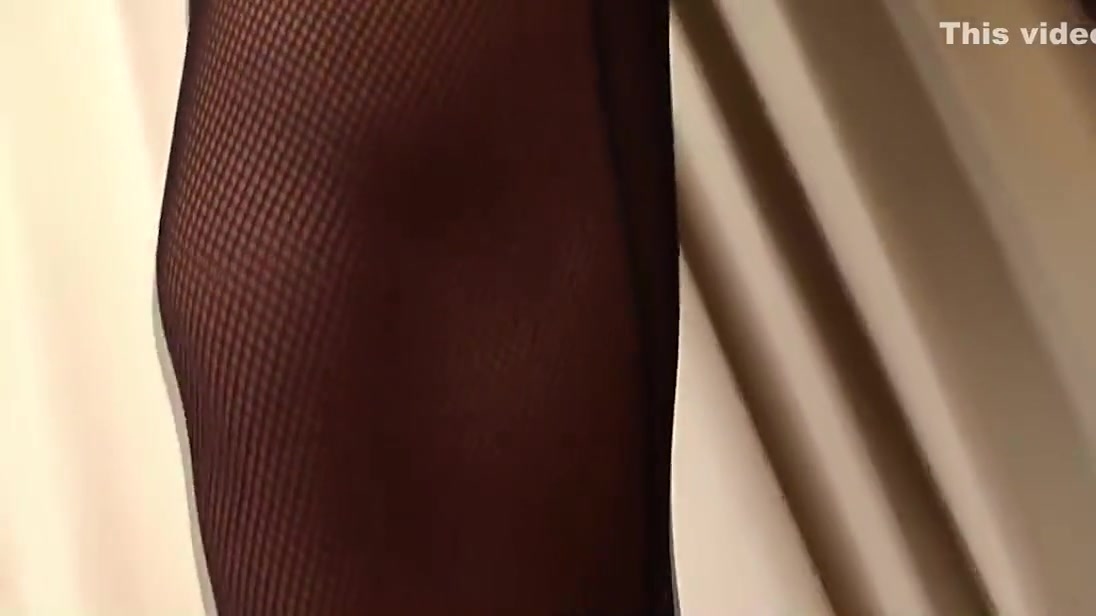 Long-haired Ladyboy In Black Fishnet Stockings Pumps Her