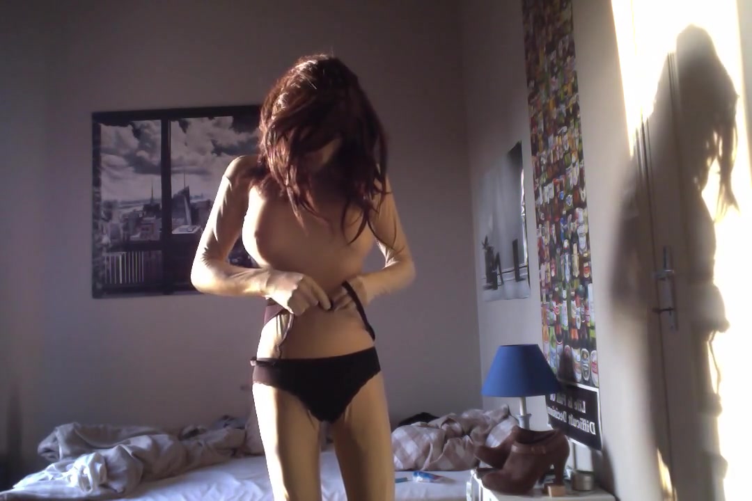 Zentai girl striptease