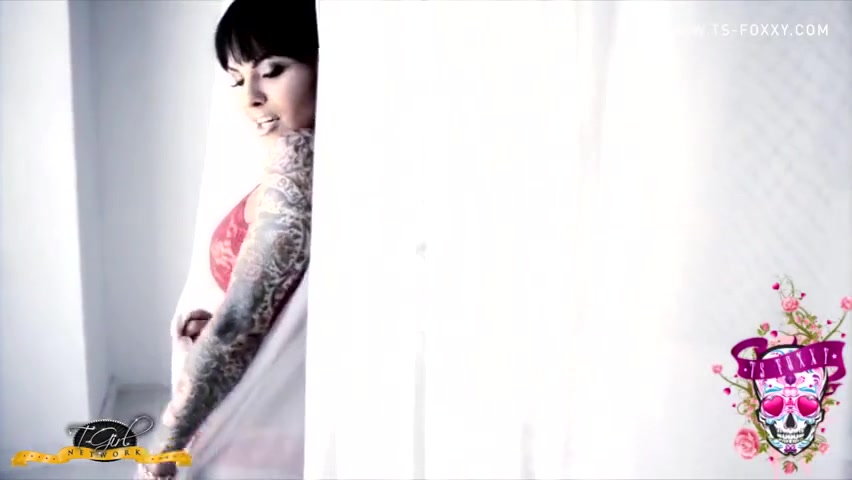 Ts Foxxy In Shemale Seductress Behind The Curtains Teases With Her Hot Body And Juicy Cock