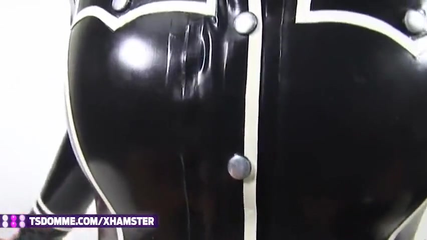Feminine Tranny In Black Latex Boots Enjoys Solo