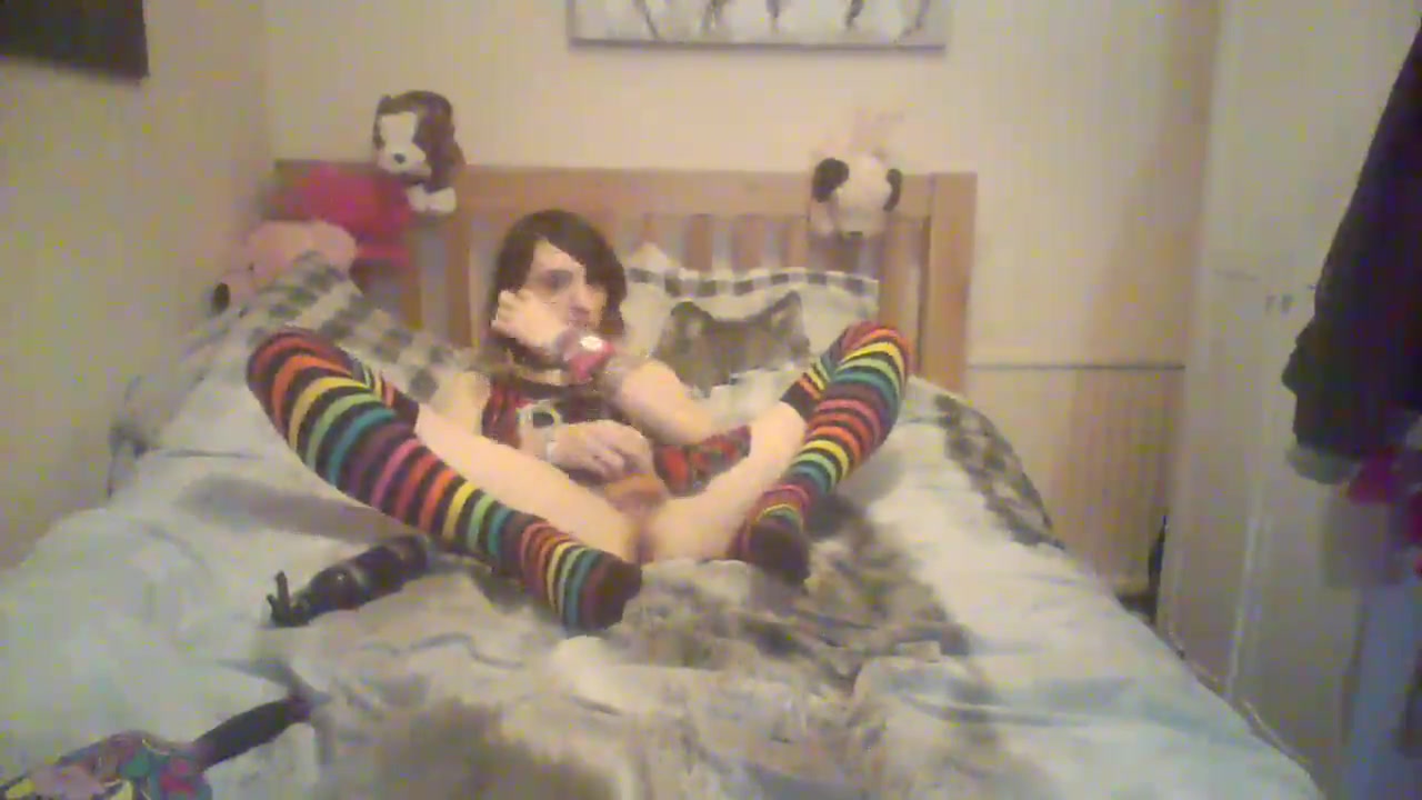 Furry Emo Femboi playing with her toys