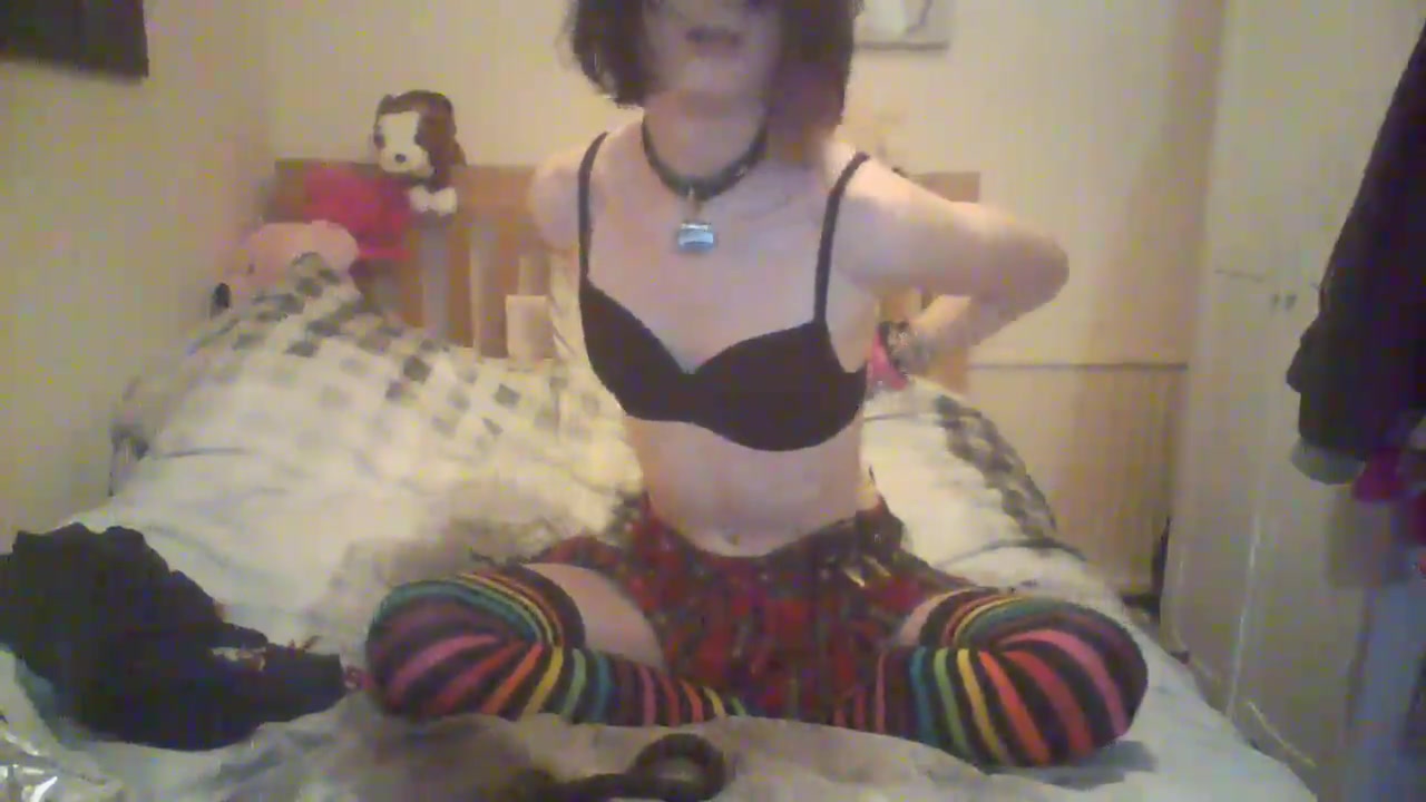 Furry Emo Femboi playing with her toys