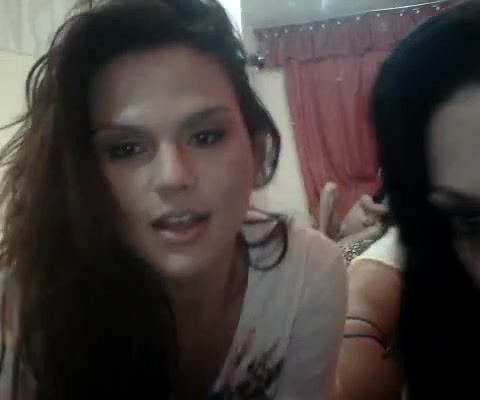 Two vey hot tgirls pose and fondle each other on the webcam