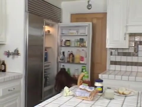Busty perverted tranny makes sandwich with cum on kitchen