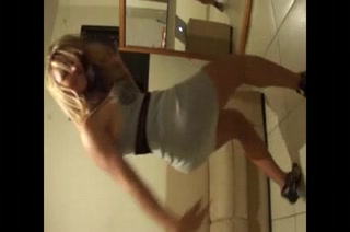 Latina blondie does a sexy dance and strokes