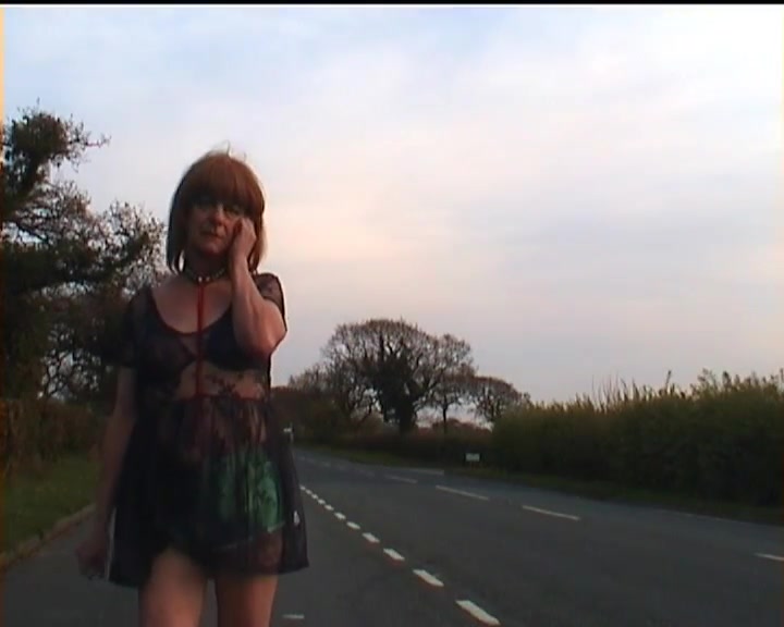Outdoor crossdresser in lingerie