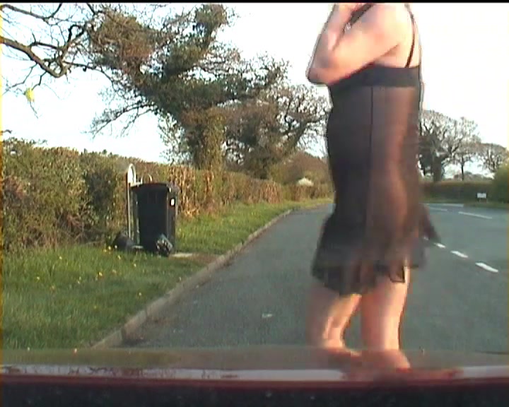 Outdoor crossdresser in lingerie