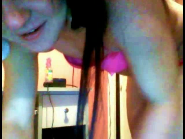 Beautiful brunette rubs her pink asshole on cam