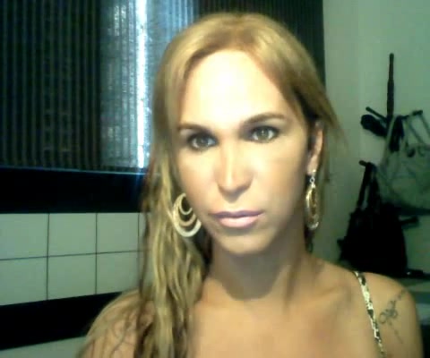 Tgirl eats two cocks on cam