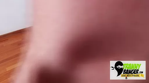 Dark Tan Tranny With Long Black Hair And Big Tits Strips Her Big Tan Ass And Gets Her Cock Out To Get On Her Knees And Suck The