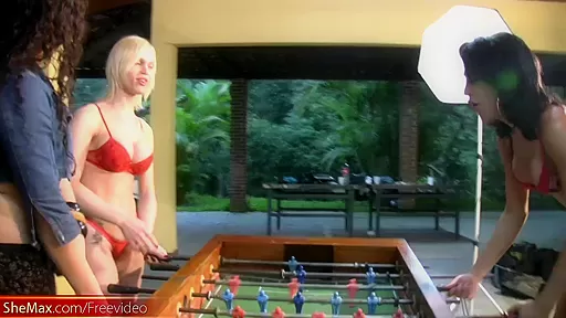 T-girls strip down lingerie and stockings playing foosball