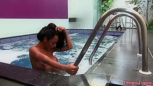 Shemale Adrielhy Bronze takes a dip and a piss