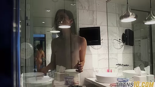 Smalltitted tranny showering while filmed