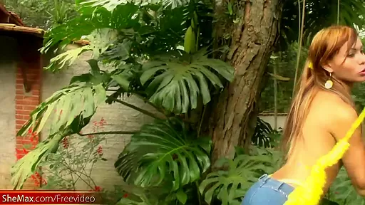 Beautiful Latina tranny exposes massive ass in tight thongs