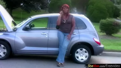 Redhead shebabe strips down in exchange for the car fix