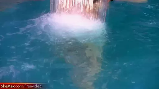 Big ass tranny plays with her massive penis in pool and cums