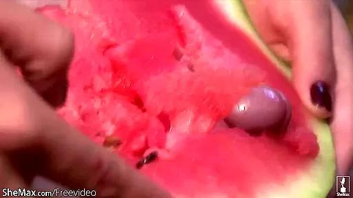 Lovely shemale pounds a watermelon so hard that she cumshots