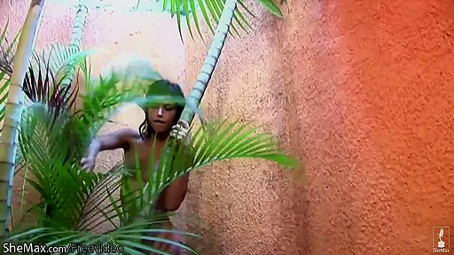 Chick with dick plays with her small titties and watermelon