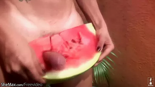 Lovely shemale pounds a watermelon so hard she cumhots